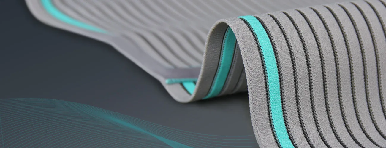 Tynor Abdominal Support 9 Inch close-up: striped elastic webbing