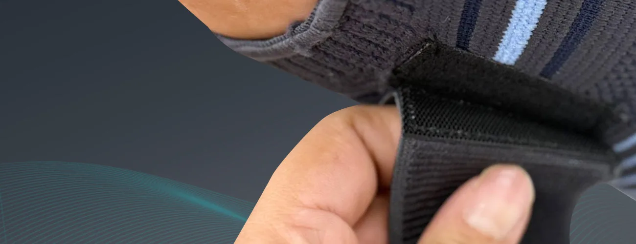 Tynor Ankle Binder close-up: hook-and-loop strap tab