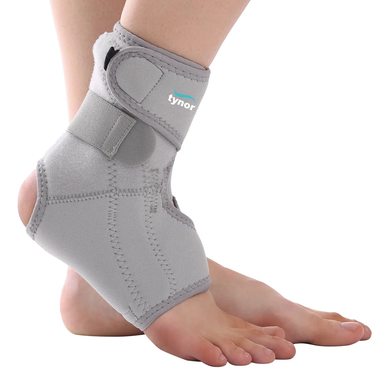 Tynor Ankle Support (Neoprene) in grey, worn on the ankle, side view
