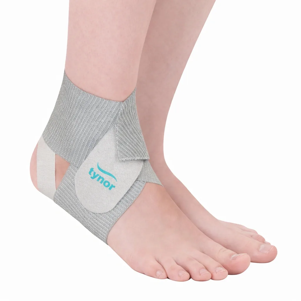 Tynor Ankle Wrap Sleek Elastic in grey, worn on the ankle, side view