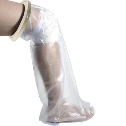 Tynor Cast Cover Leg in clear PVC with a cream neoprene ring, worn over a leg cast