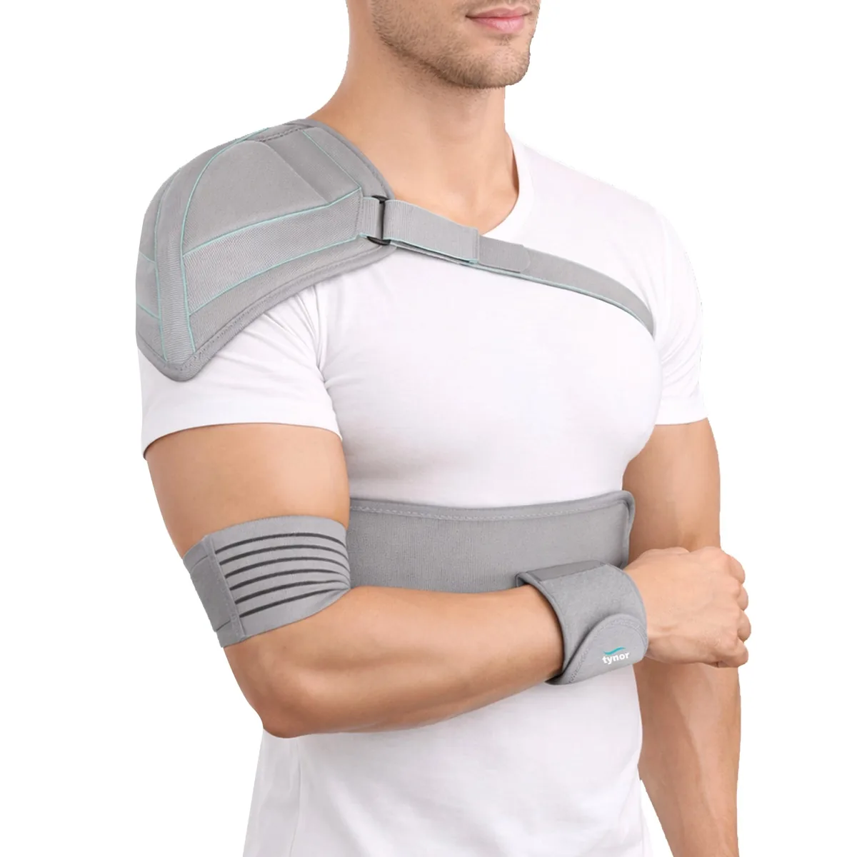 Man wearing the Tynor Elastic Shoulder Immobiliser in grey, with shoulder cup, chest band, arm cuff and wrist cuff