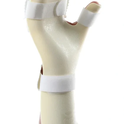 Tynor Hand Resting Splint in beige worn on the hand and forearm with white straps