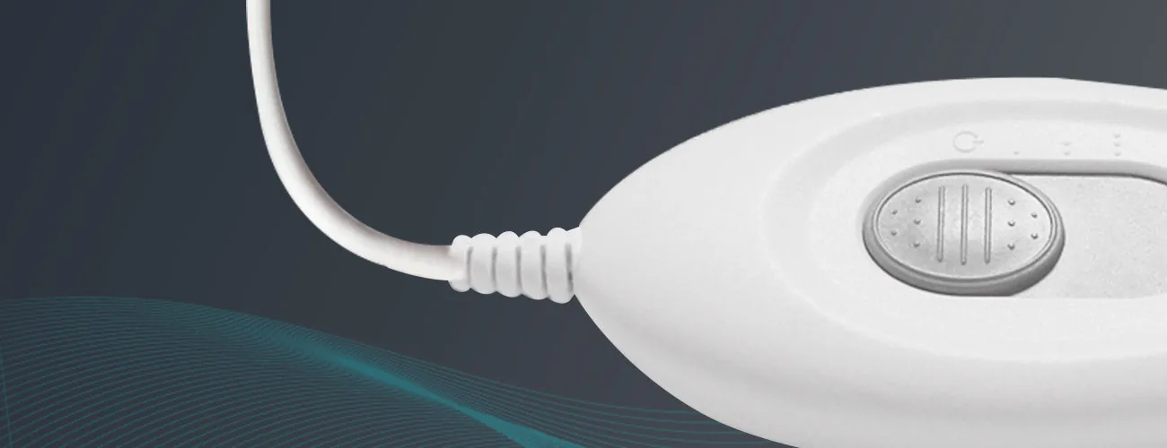 Tynor Heating Pad Ortho close-up: heat setting switch
