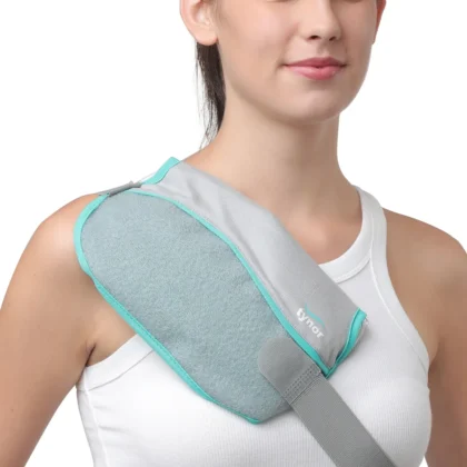 Tynor Hot & Cold Pack (Beads) in a grey cover with a teal edge, strapped over a woman's shoulder