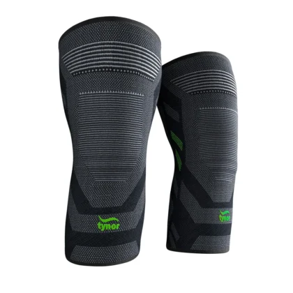 Tynor Knee Cap Air Pro in black and green, two knee sleeves standing side by side with green logos