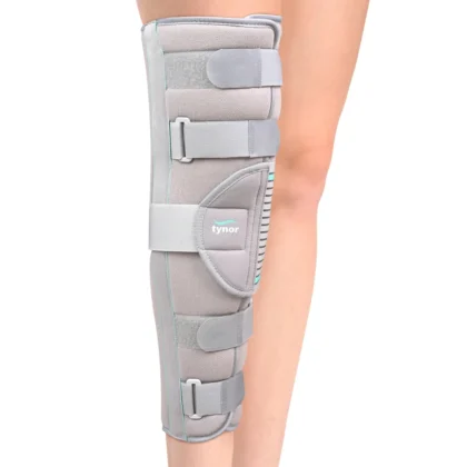 Tynor Knee Immobiliser 19 inch in grey, worn on the leg, front view