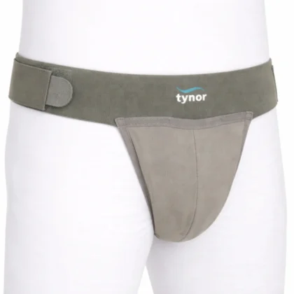 Tynor Scrotal Support in grey worn over white base layers, front view of the waistband and pouch