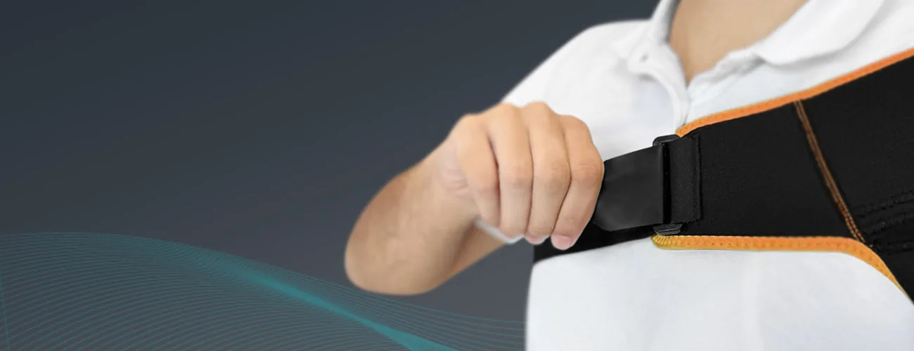 Tynor Shoulder Support Double Lock (Neo) close-up: pulling the chest strap