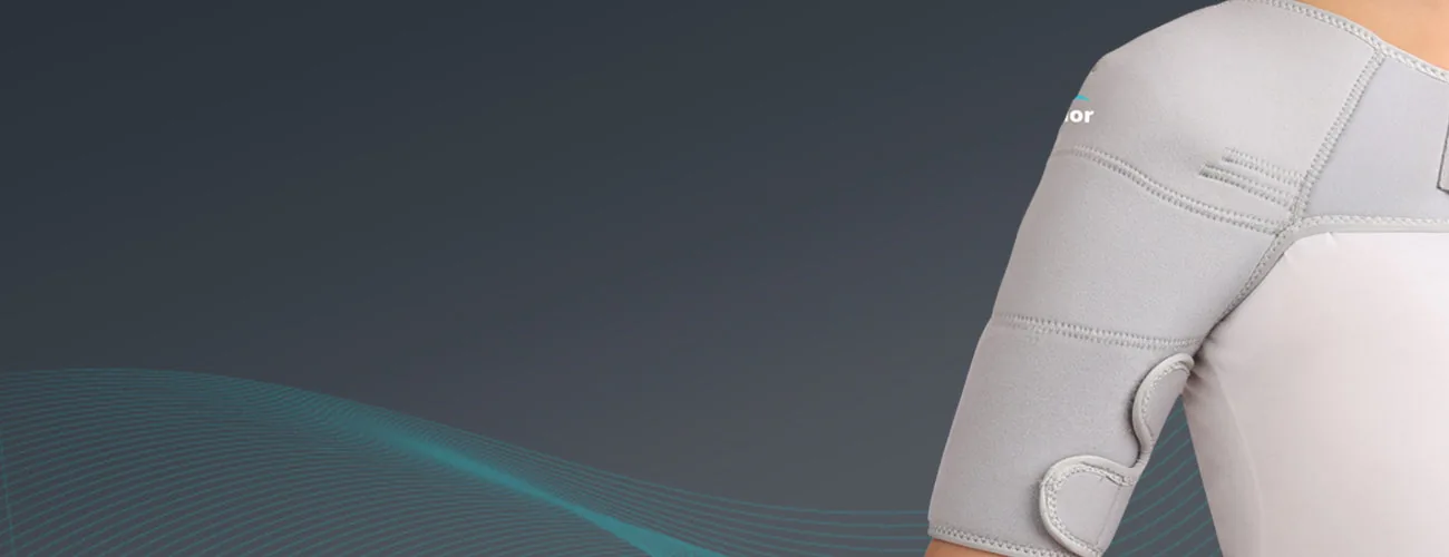 Tynor Shoulder Support (Neoprene) close-up: upper-arm hook-loop band