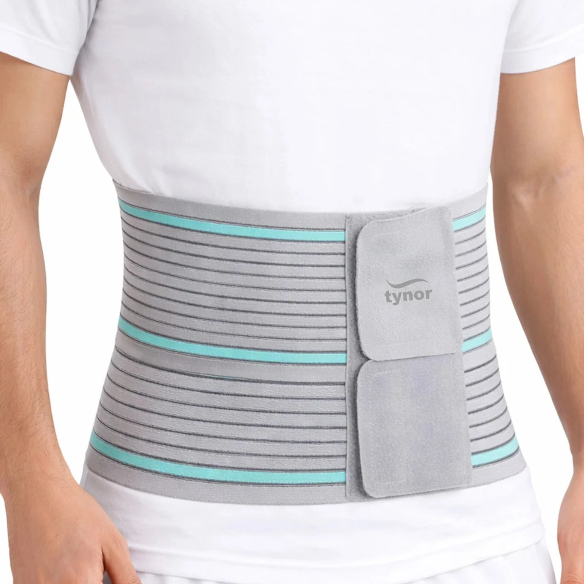 Tynor Tummy Trimmer Abdominal Belt in grey with teal stripes, worn over a white T-shirt with front hook-loop panels