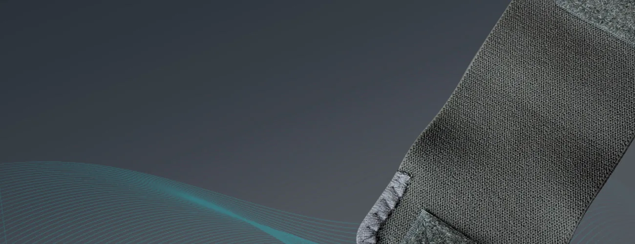 Tynor Wrist Brace With Thumb close-up: elastic webbing