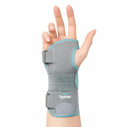 Tynor Wrist Splint Ambidextros in grey with teal trim worn on the hand and wrist, fingers and thumb free
