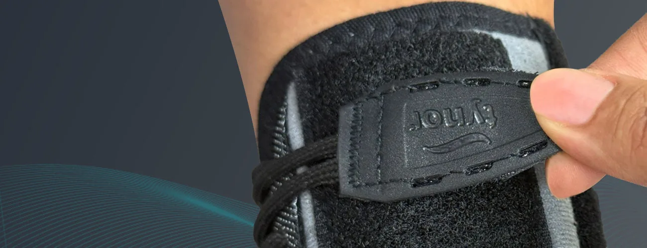 Tynor Wrist Splint With Thumb close-up: lace-pull tab