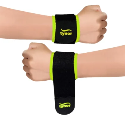Two Tynor Wrist Support (Neo) cuffs in black with green edging on both wrists, one fastened and one with the strap open