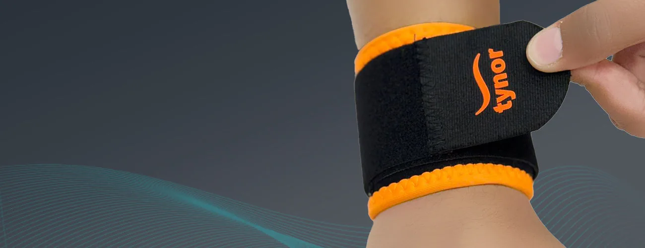 Tynor Wrist Support (Neo) close-up: closing the stretch strap